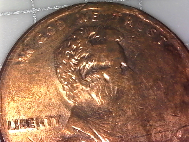 Is-This-2000-Penny-Damaged-Enviromentally-Or-By-Mint