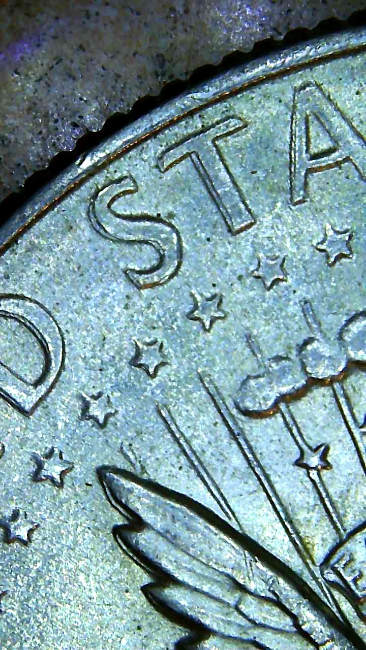 1969-Kennedy-Half-Cracked-Rim?-Doubling?-Head?