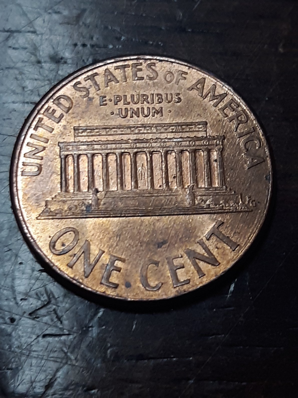 1998-D-Penny-With-DD-On-The-Top-Of-His-Ear.