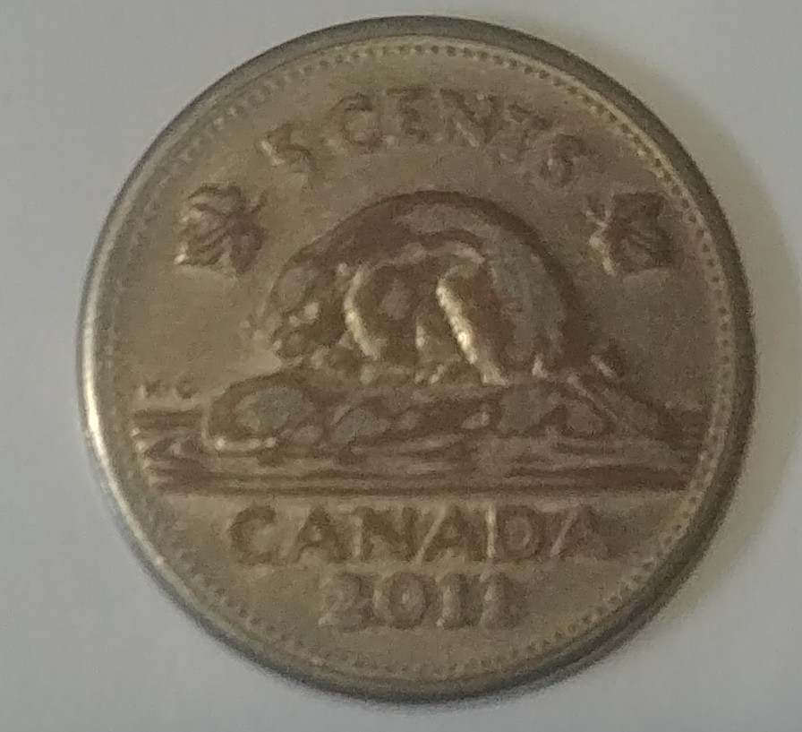 2011-5-Cent-Very-Strange-Help-Me-Out.
