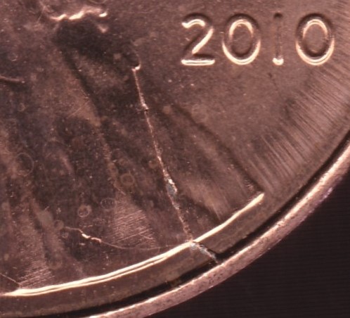 Post-A-Coin-Or-Medal-With-A-Die-Crack!