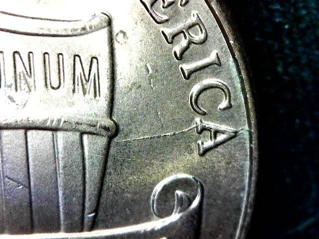 Post-A-Coin-Or-Medal-With-A-Die-Crack!