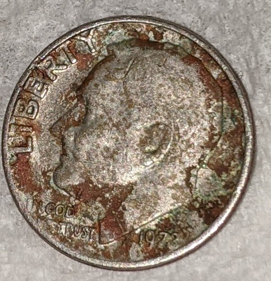 Is-This-Post-Mint-Damage-Or-Some-Sort-Of-Strike-Through-Or-Just-Pareidolia?-On-My-73-Roosevelt-Dime?