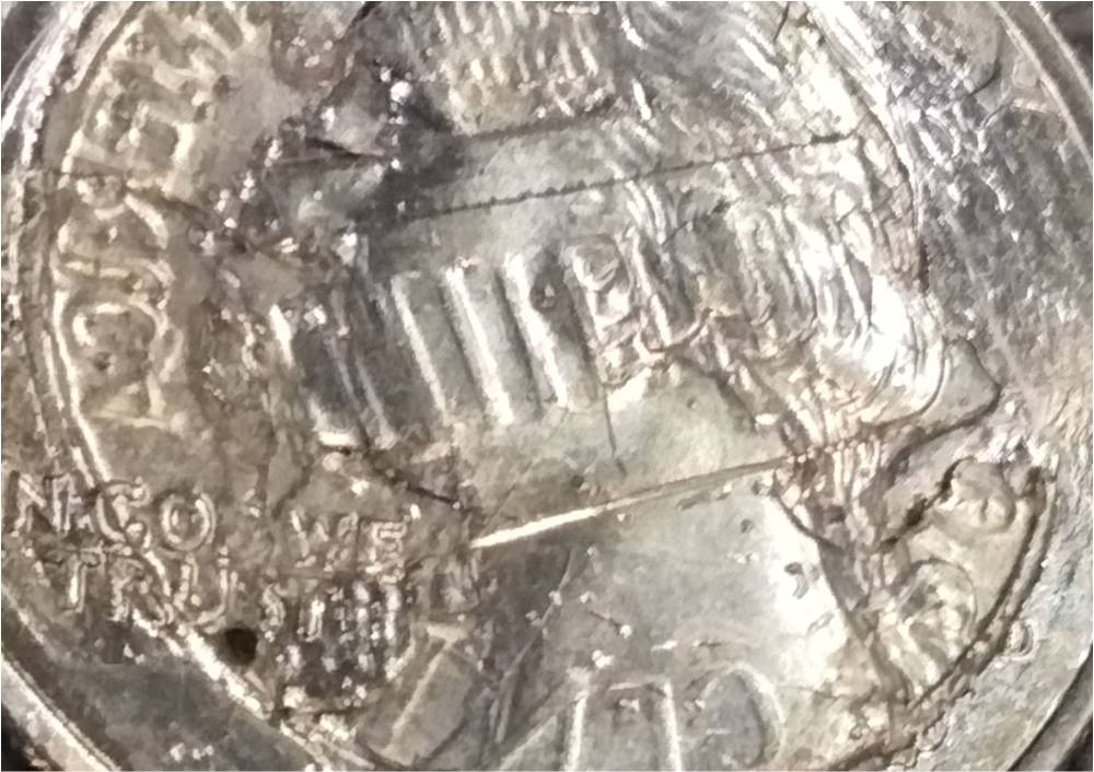 Penny-Stamped-On-A-Quarter