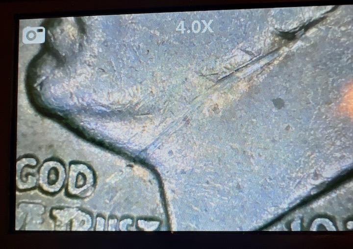 Strike-Through-Or-Aftermarket-Error?-1970-Dime