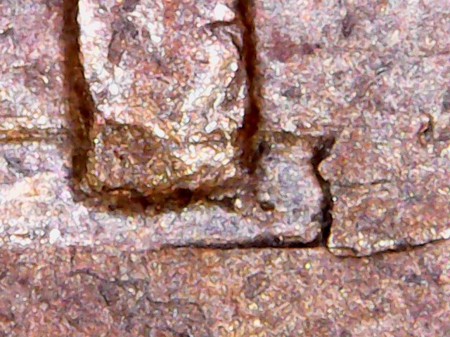 Need-Help-With-A-1945-D-LWC-Possible-Struck-Through-Staple-Or-Metal-Scrap?