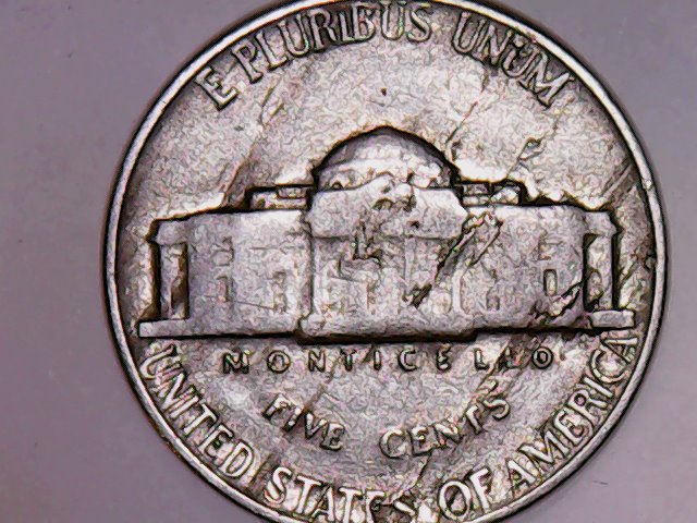 1947-P-Jefferson-Nickel-Serious-Lamination.-But-What-Are-Dark-Streaks-Called?