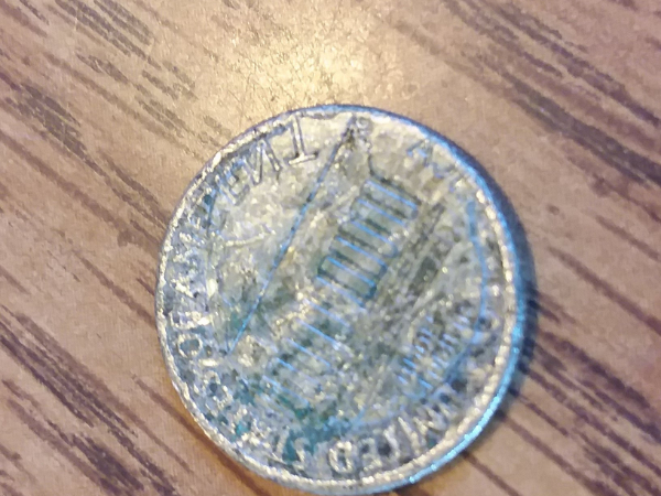 1986-D-Dime-With-A-Penny-Stamp-Reverse