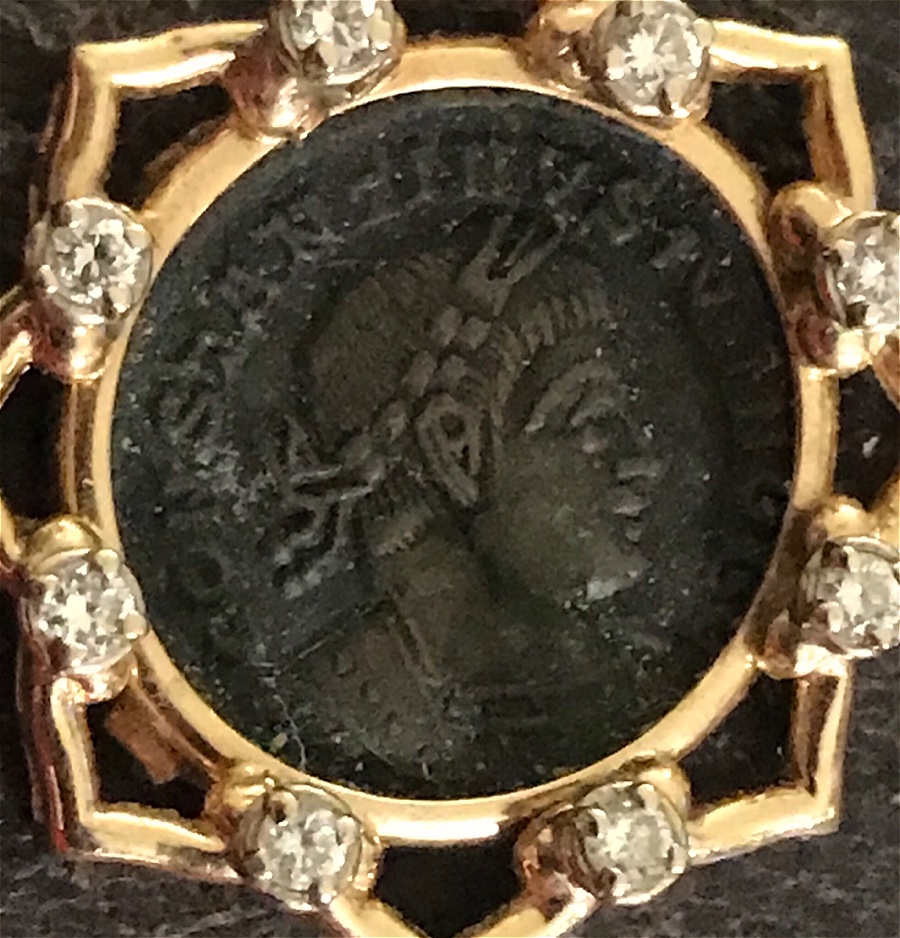 Old-Coin-In-A-Clasp.