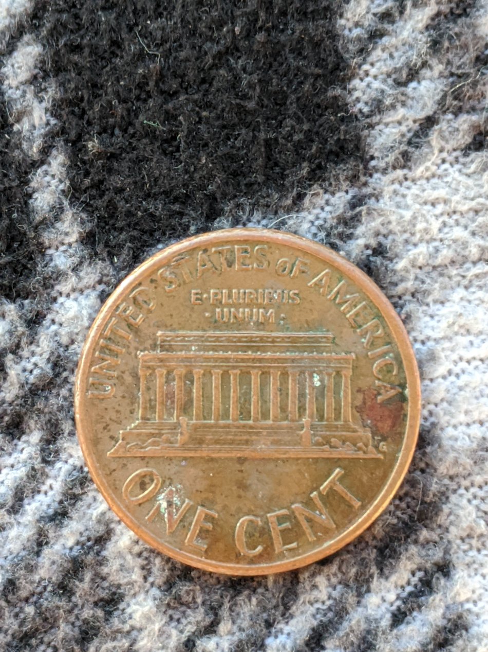 Is-This-Just-A-Die-Chip-Running-Along-The-Top-Of-T-In-States?-1991-Cent