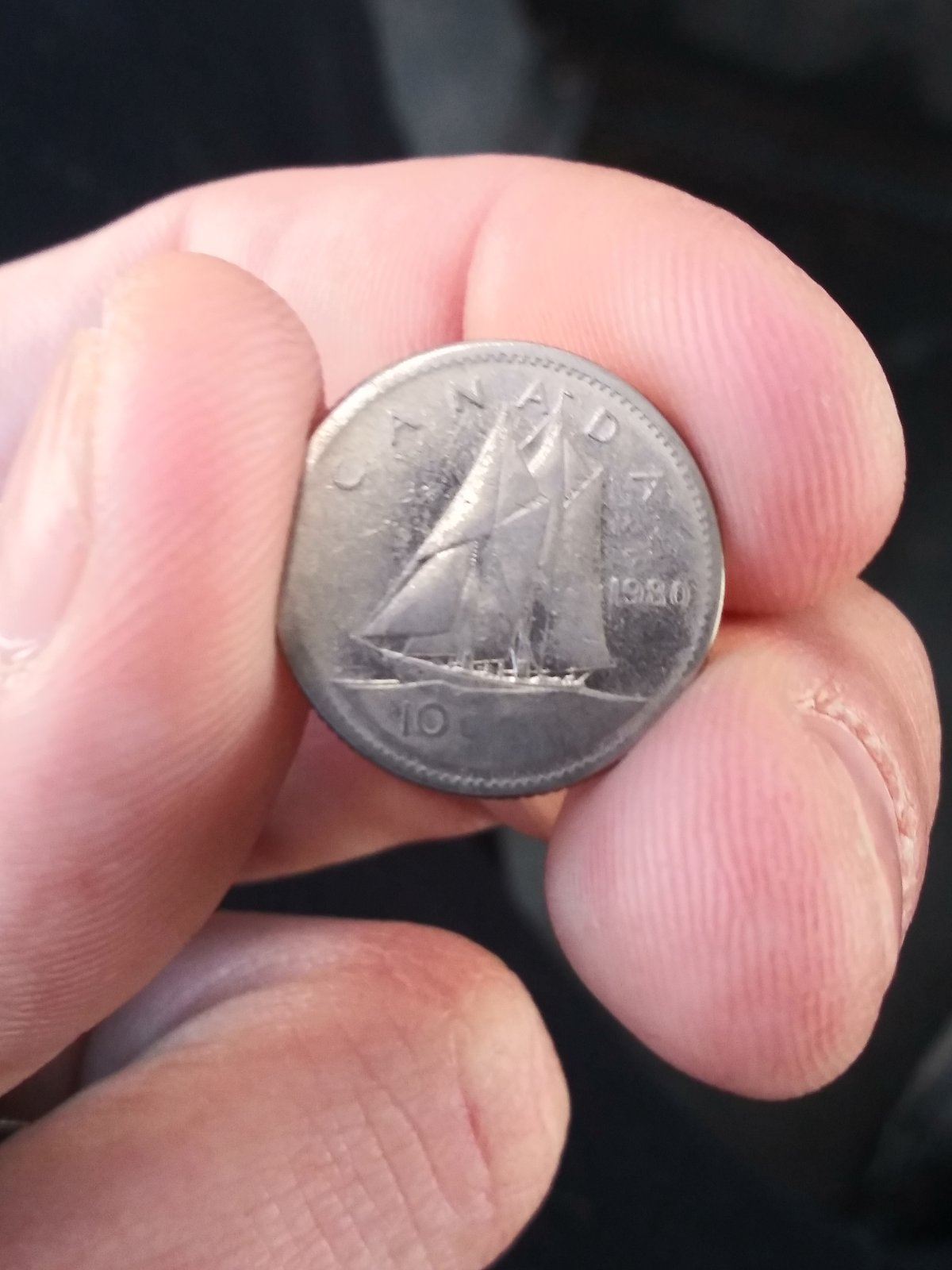 1980-10-Cents.-Grease-Filled-Die,-Possible-Weak-Strike-Or-PMD?