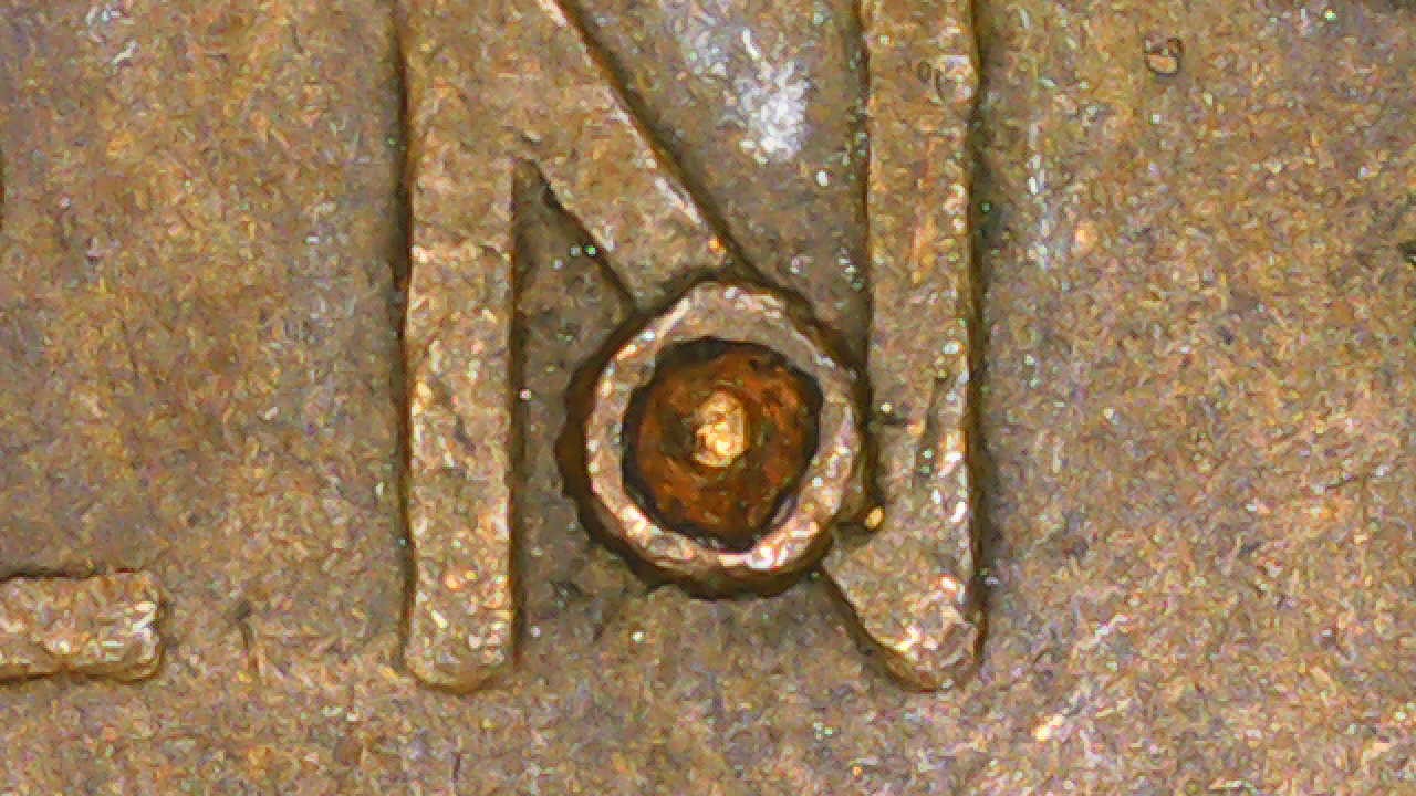 1956-D-Penny-With-Volcanic-Craters-On-Obverse-And-Reverse.--Very-Unusual