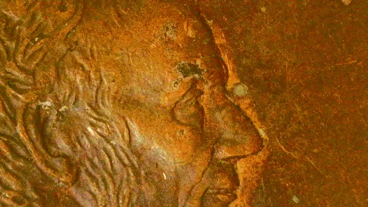 Bullet-Exiting-Lincoln's-Eye-On-1999-Penny.-Looks-Cool.