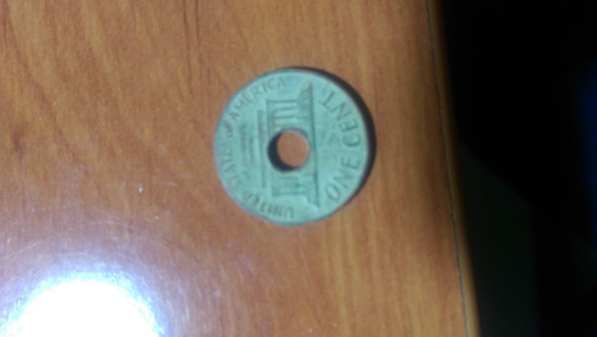 1971-D-Mint-U.s-Penny-With-Hole-Right-In-The-Center.