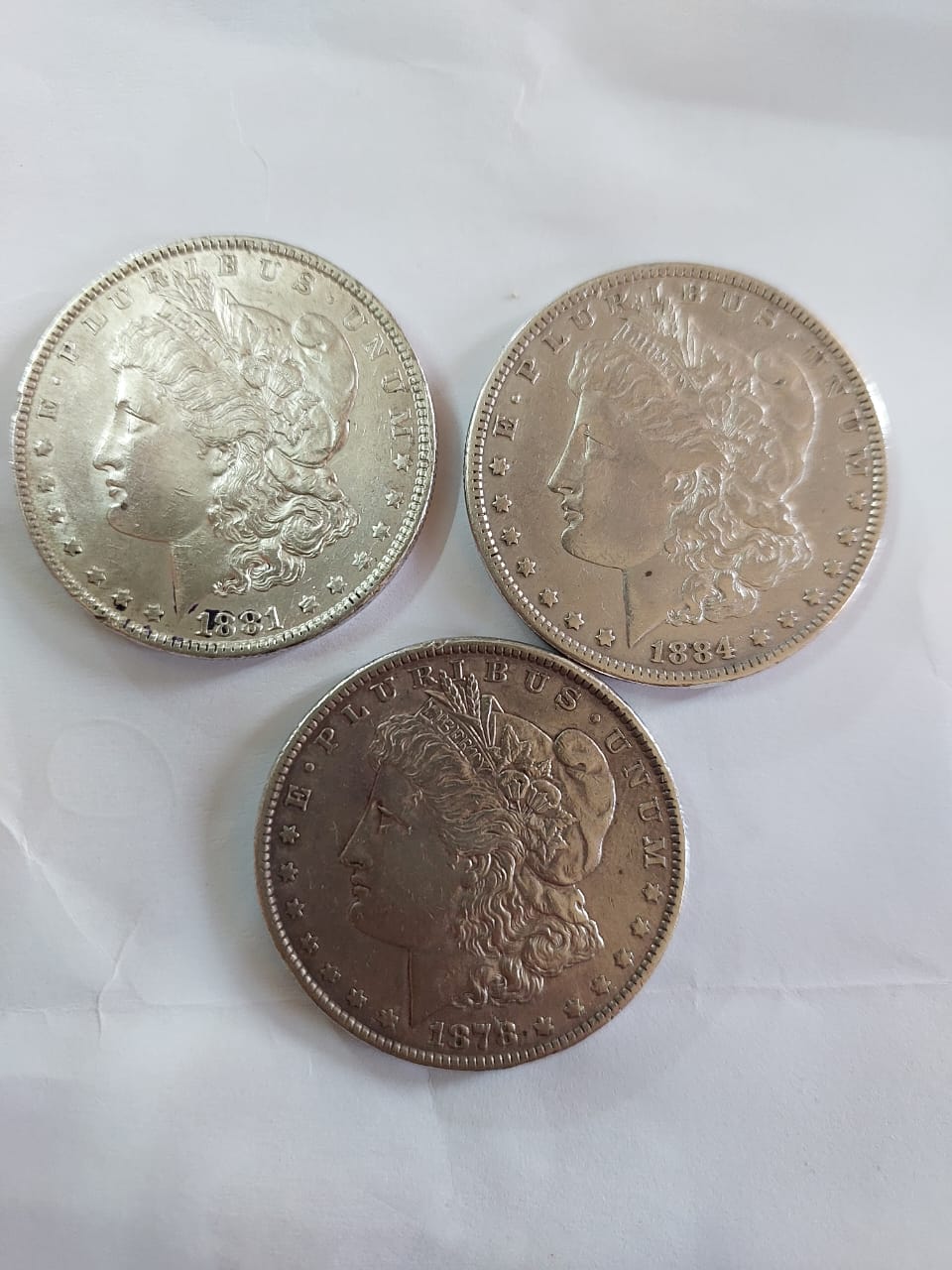 Three-Morgan-Dollars