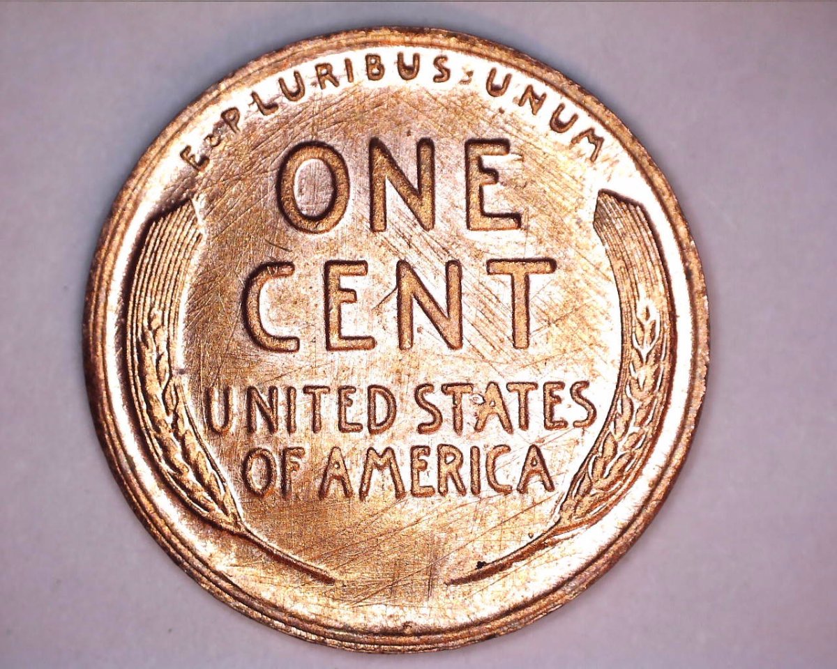 Strange-Non-Steel-1943-Cent-And-Another-Strange-1945-One-Cent-Coin