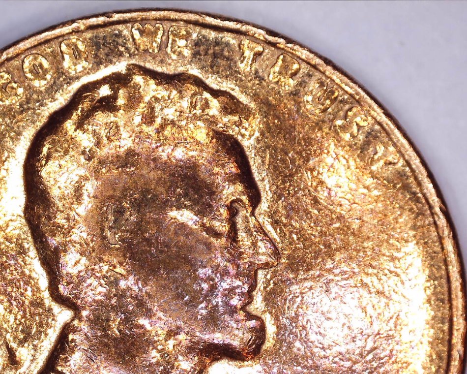 Strange-Non-Steel-1943-Cent-And-Another-Strange-1945-One-Cent-Coin