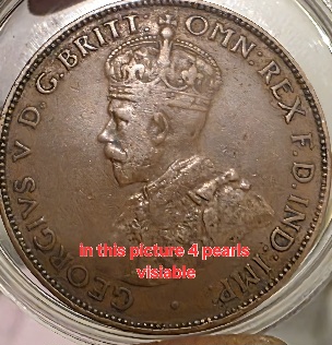 1934-Half-Penny-With-Something-Embedded?