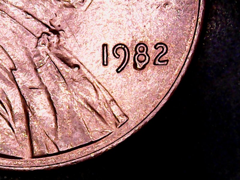 1982-P-Small-Date-With-Cud-On-8-0f-Date