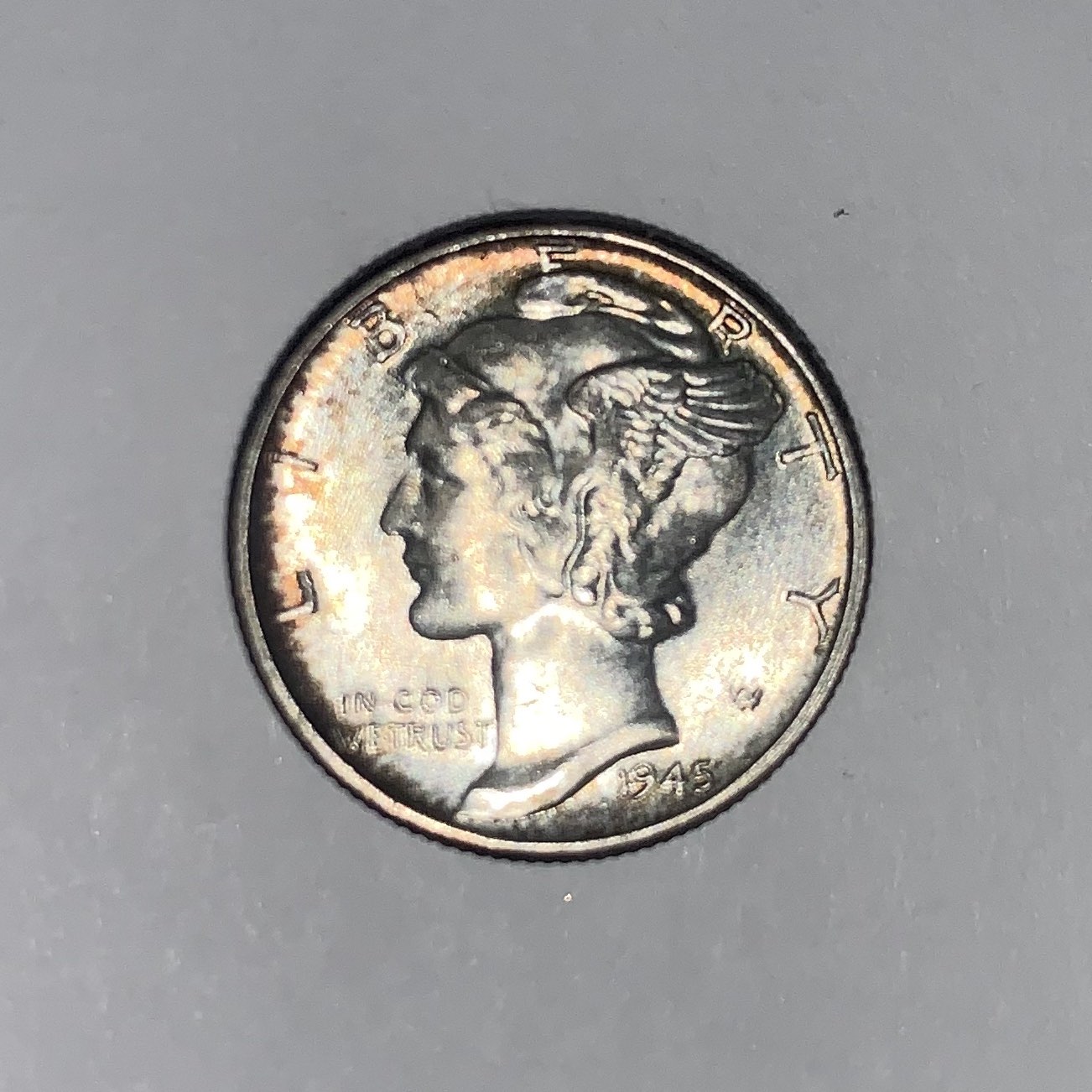 1945-Mercury-Dime.-Extreme-Toning-On-Reverse