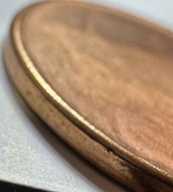 1995-Lincoln-Cent-Struck-Through-A-Late-Stage-Die-Cap