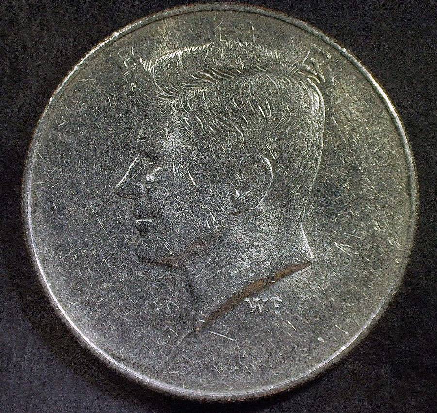 Unknown-Date-Obverse-And-Reverse-Major-Greaser-Strike-Through-Error?