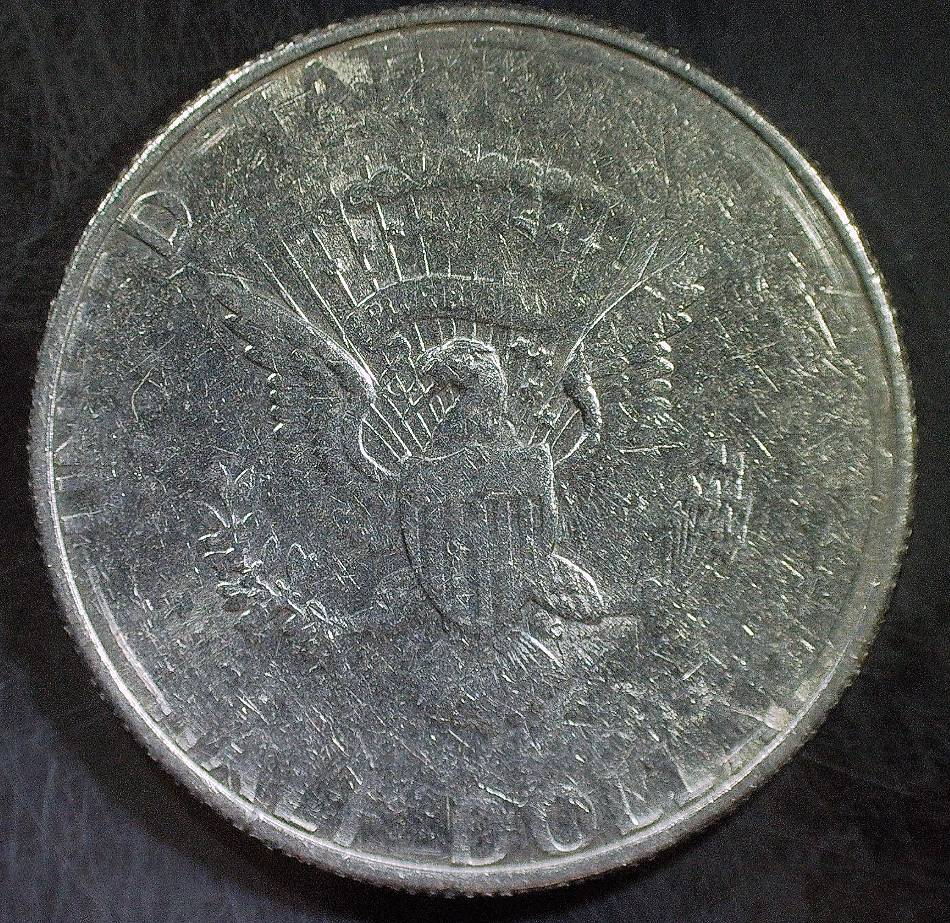Unknown-Date-Obverse-And-Reverse-Major-Greaser-Strike-Through-Error?