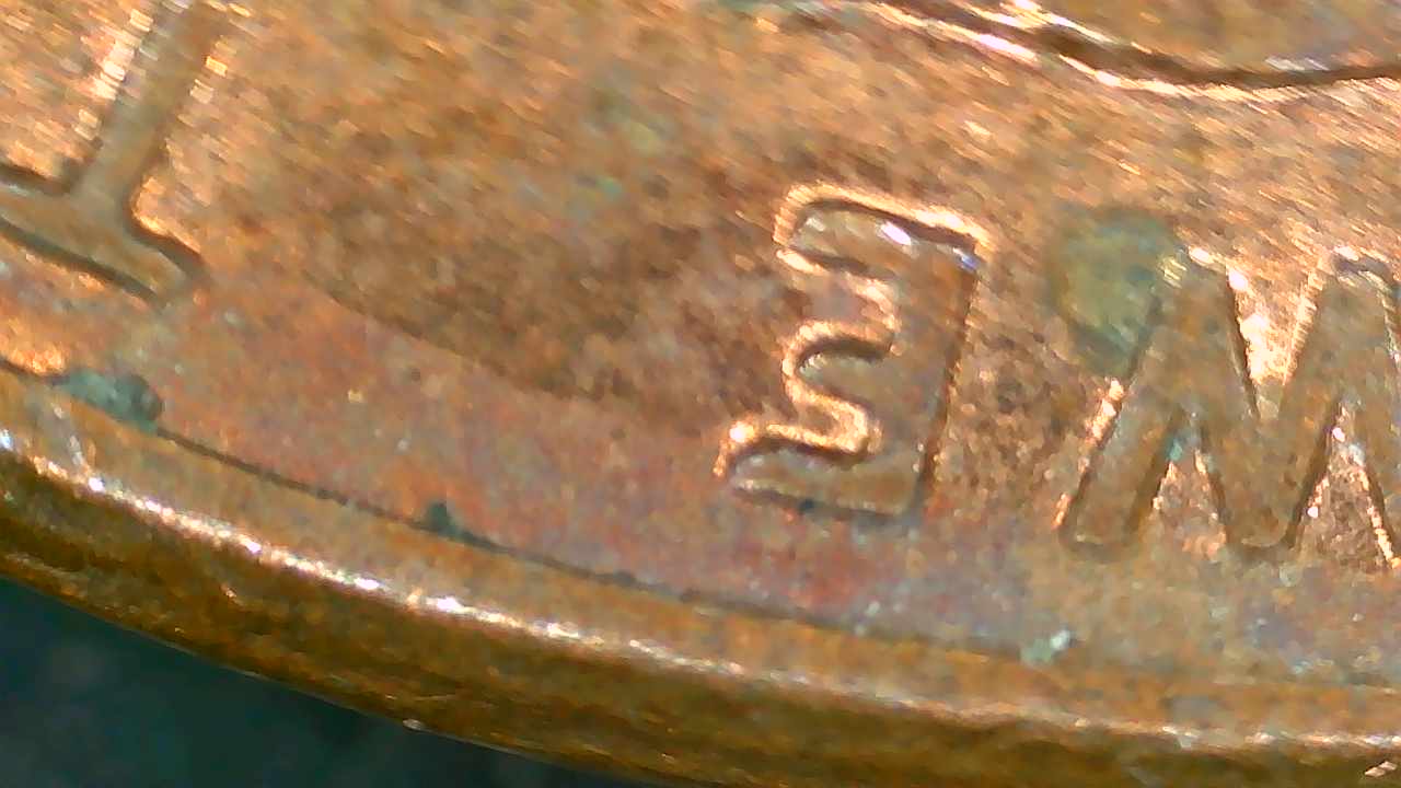 Word-On-Coin-Looks-Crazy