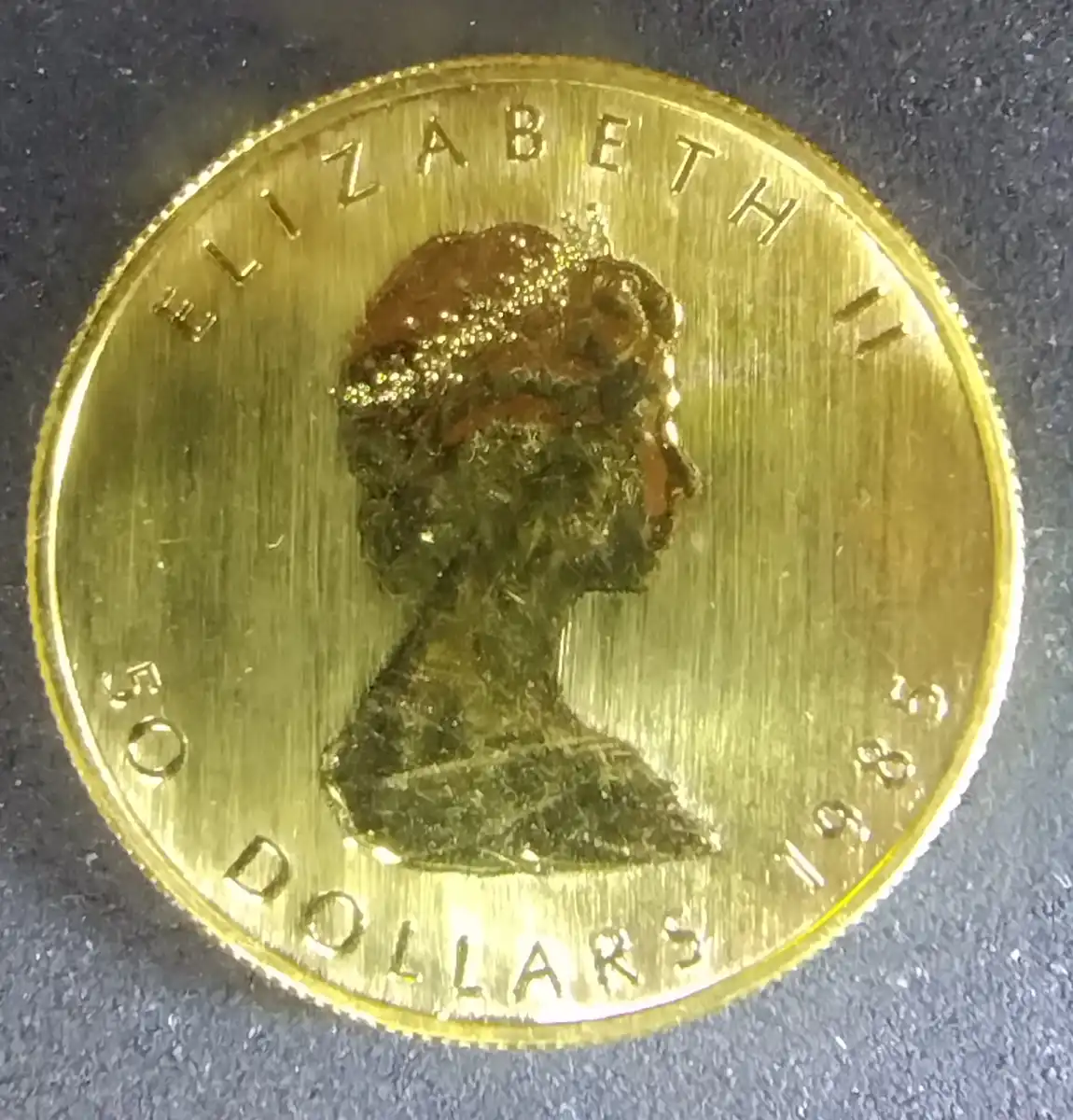 Value-Of-1984-And-1985-$50-Canadian-Maple-Leaf-Gold-Coins-Featuring-Queen-Elizabeth-II