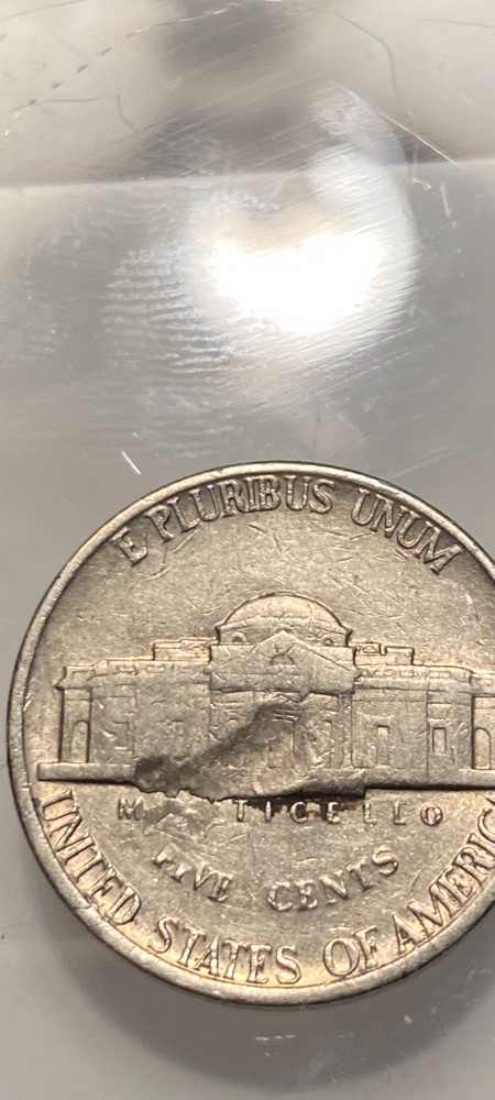 What-Would-This-Indent-On-1979-D-Nickel-Be-Considered..?