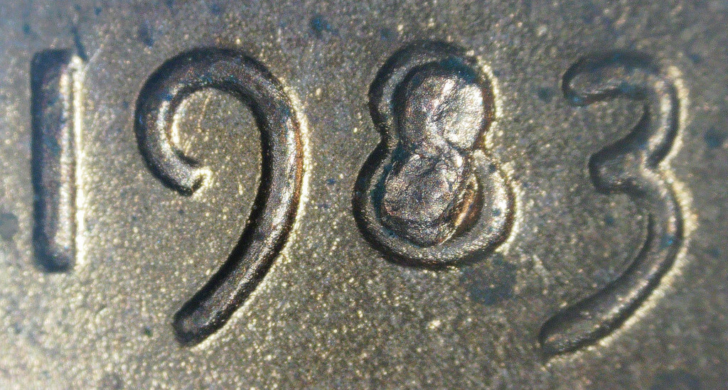 1983-Lincoln-Cent,-Extra-Material-In-Number-8-In-Year