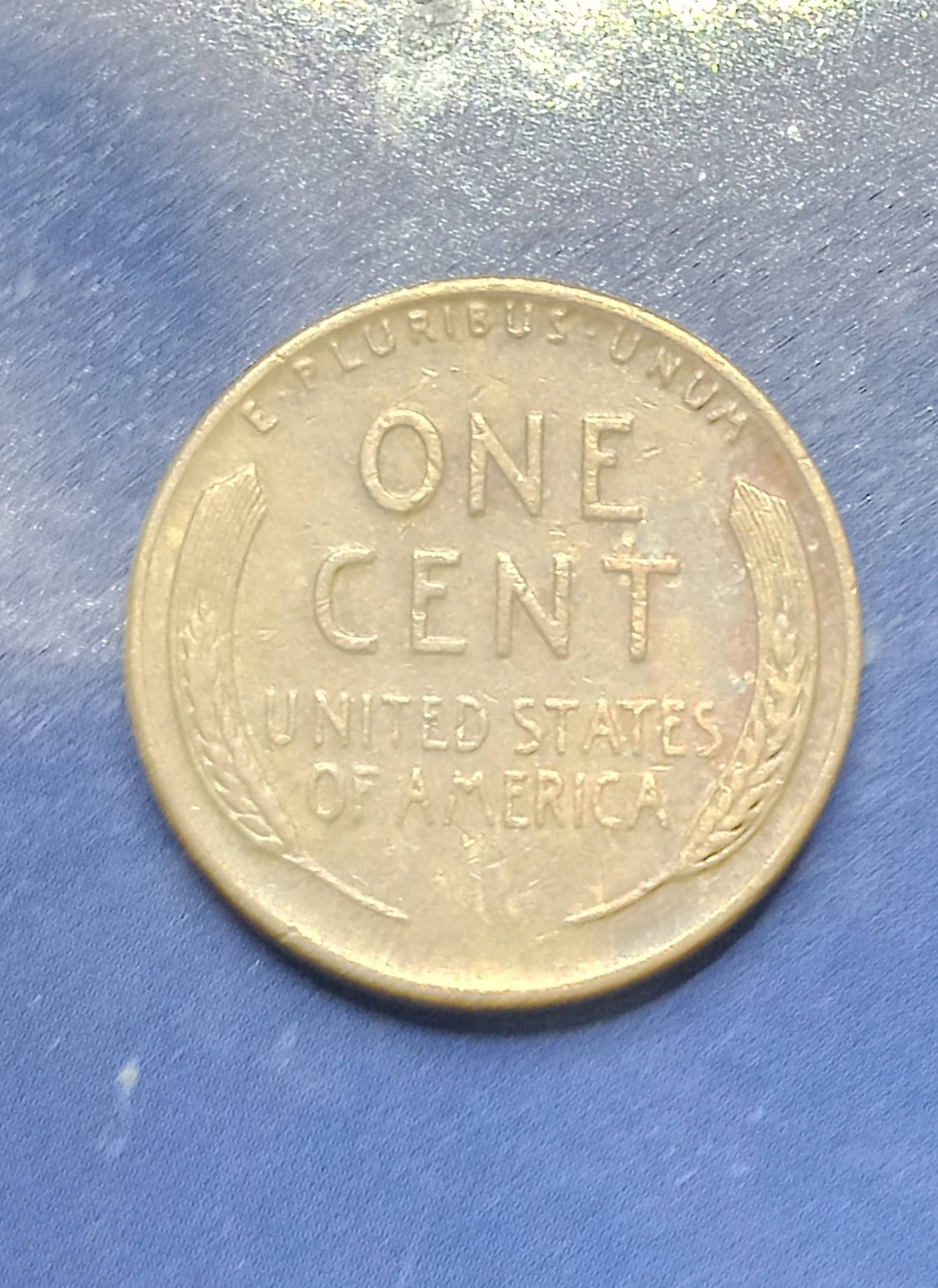 Is-This-A-Dot-Between-We-And-Trust-On-A-1951-D-Penny-?