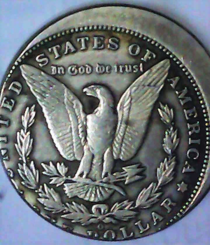 1884-O-Morgan-Silver-Dollar-Off-Center.loser.
