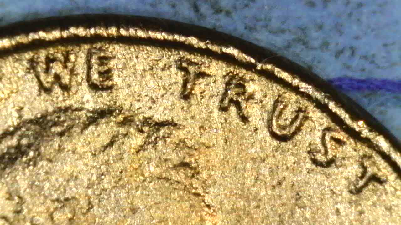 1976-D-Cent-What-Have-I-Found?--Bleb,-Occluded-Gas-Bubbles,-Flow-Lines,-Parallel-Lines?