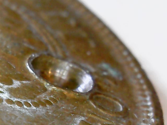 Is-This-A-Man-Made-Hole-In-My-1922-Penny?