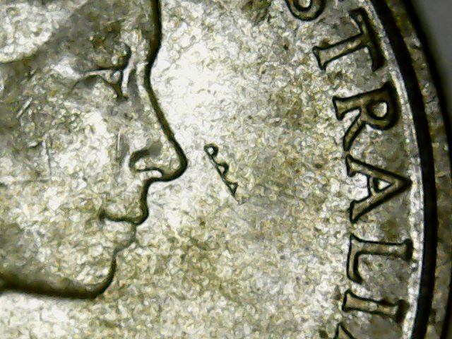 Denticle-Mark-On-1966-50-Cent