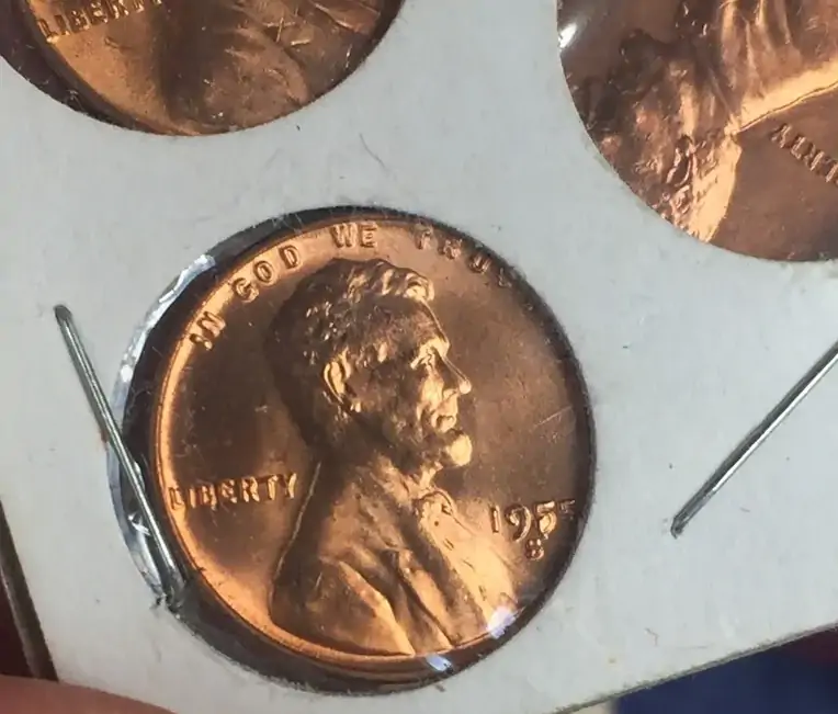 1955-S-Penny-Cud-Error-Where-The-Lower-Half-Of-The-5-Is-Filled-In.