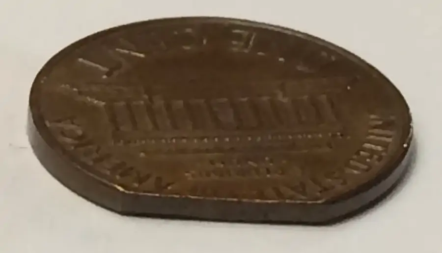 1969-Lincoln-Memorial-Cent---Clipped-Planchet-Or-PMD?