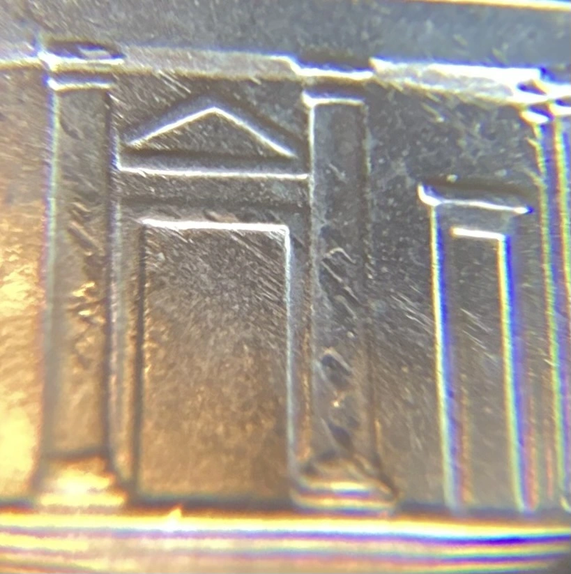 2021-P-Nickel-With-Feeder-Finger-Damage.