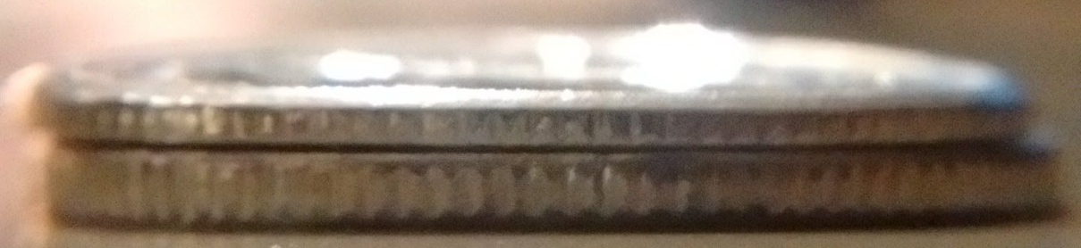 Possible-Die-Misalignment-On-2001-Year-Of-Volunteers-Dime-&-Extra-Thick?