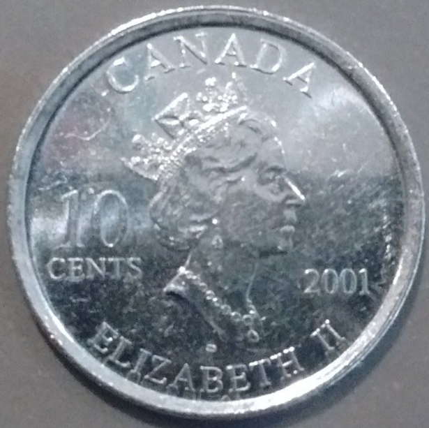 Possible-Die-Misalignment-On-2001-Year-Of-Volunteers-Dime-&-Extra-Thick?