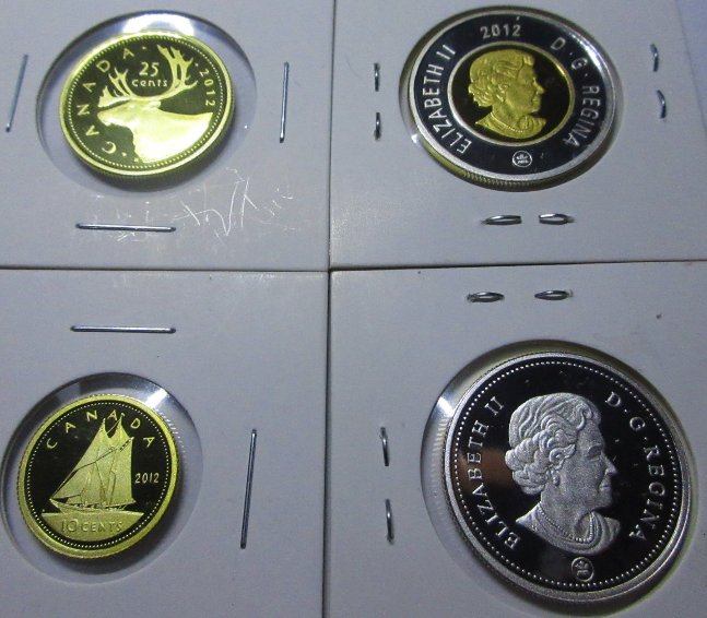 Peculiar-Toning-/-Gold-Tint-On-Coin-Obverse-From-Silver-Proof-Sets
