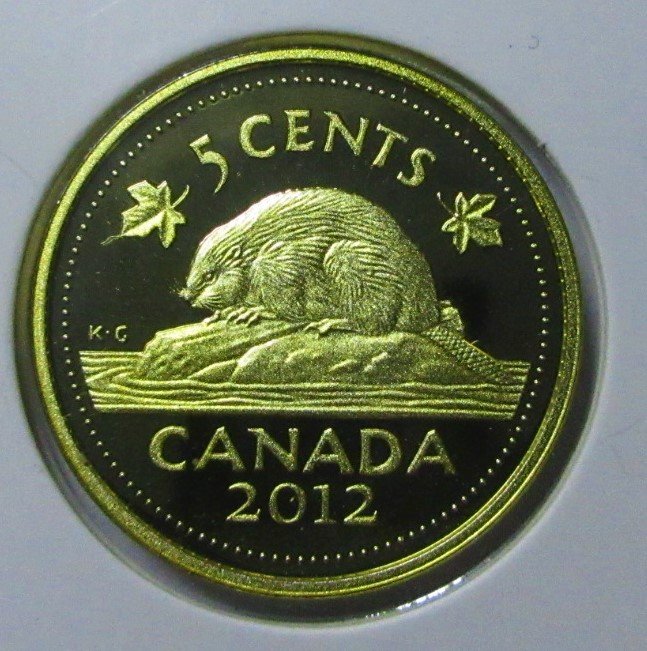 Peculiar-Toning-/-Gold-Tint-On-Coin-Obverse-From-Silver-Proof-Sets
