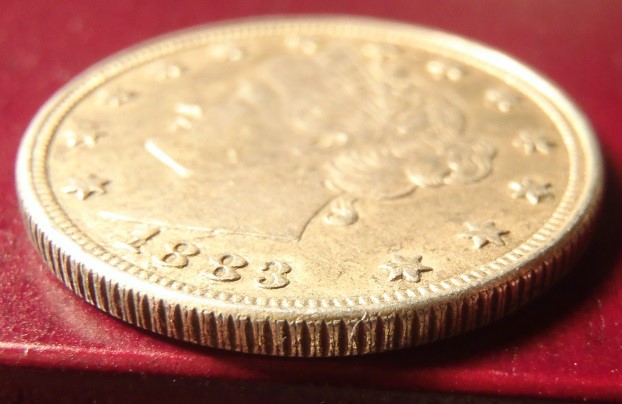 How-Does-One-Tell-If-A-Racketeer-Coin-Is-A-Real/Original-Racketeer-Coin?