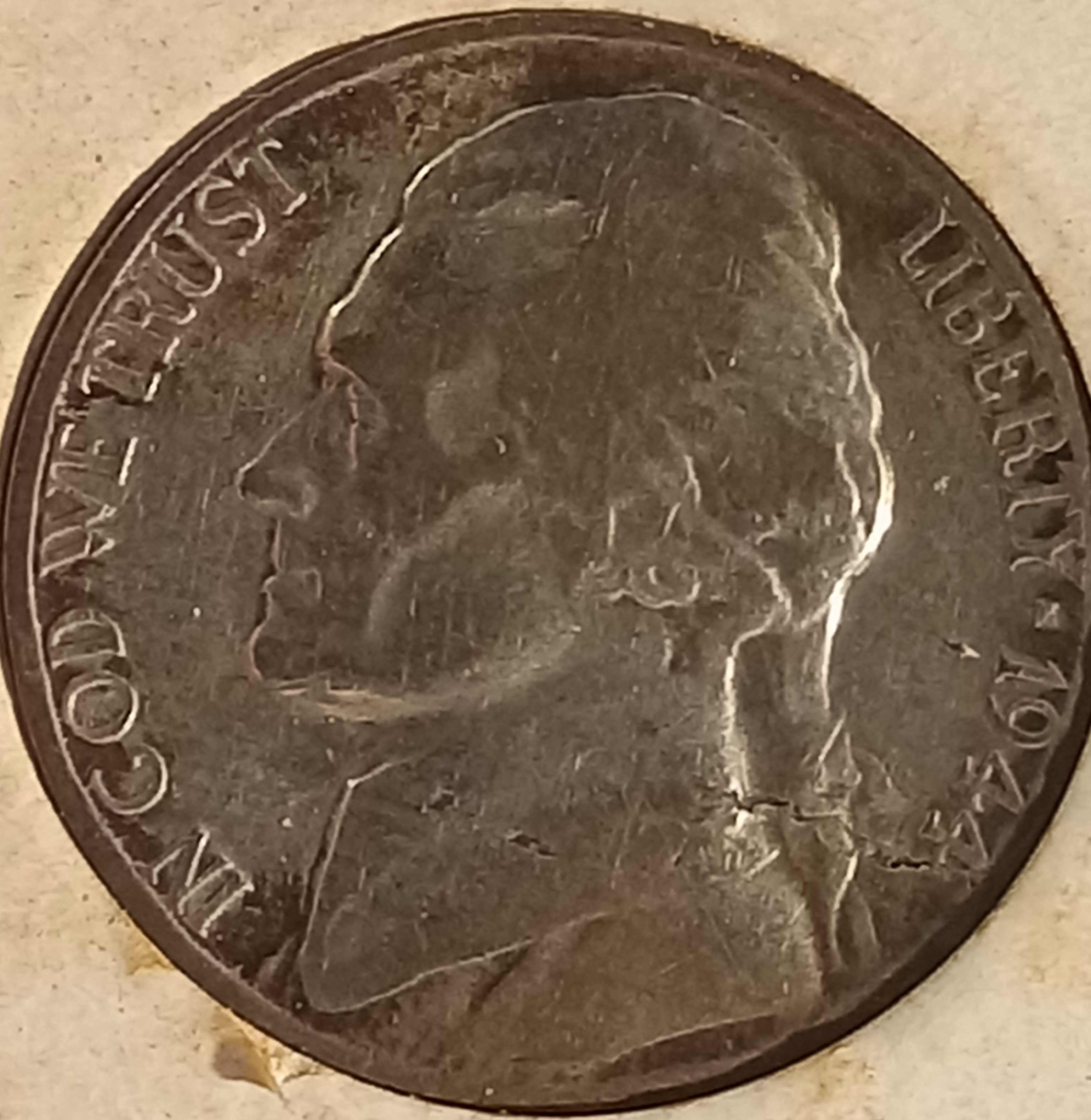 Any-Info-On-These-War-Nickels,-Inserted-Into-Crown-Sets?--Lamination-Common?