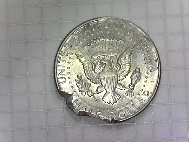 1964-Kennedy-Half.-Clipped-Planchet-Or-PSD?