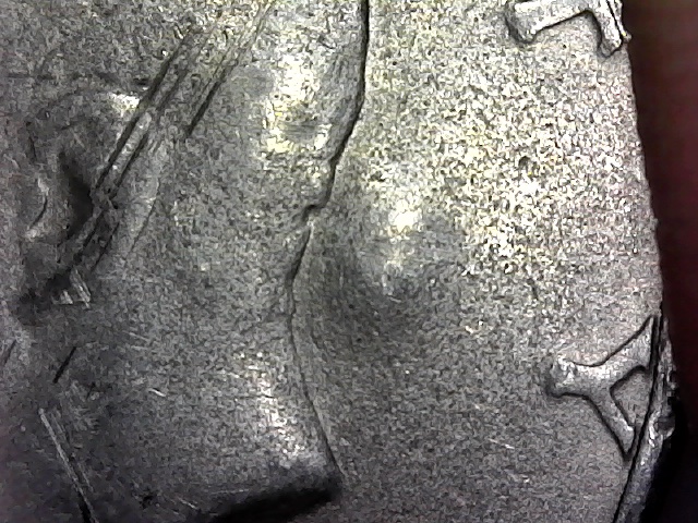 1776-1976-D-Kennedy-Half.--Large-Raised-Areas-On-Both-Sides?