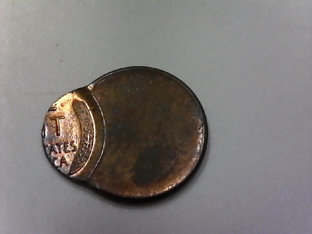 Three-Lincoln-Cents-Struck-Off-Center-And-One-?-Jewelry-Piece?