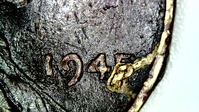 1945-LWC-Any-Ideas-On-The-Damage-On-The-Date-Of-This-Coin?