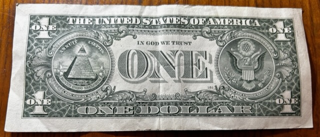 Series-2009-One-Dollar-Bill.-Over-Inked-Serial-Number?